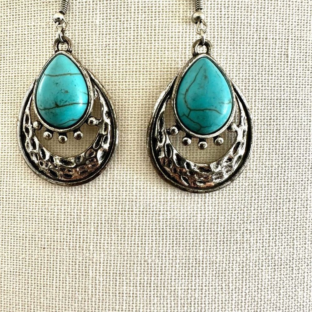 Silver tone and blue drop earrings